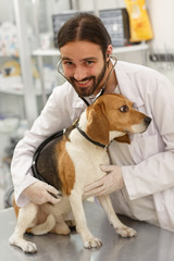 Fototapeta na wymiar Picture of manand dog during medical examination.