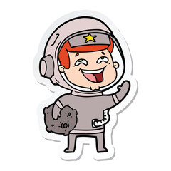 sticker of a cartoon laughing astronaut