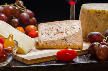 Mexican artisanal cheeses and heirloom tomatoes, wine and grapes