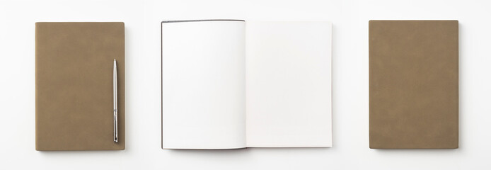 brown notebook and pen on white background