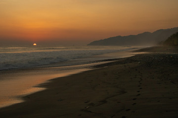 Fototapeta na wymiar A Beautiful Sunset at a Sandy Beach