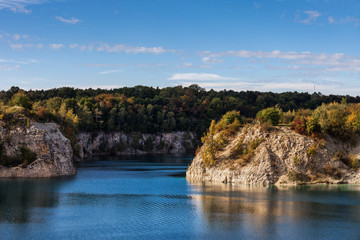 Poland, Krakow, Zakrzowek reservoir, lake and cliffs at old limestone quarry