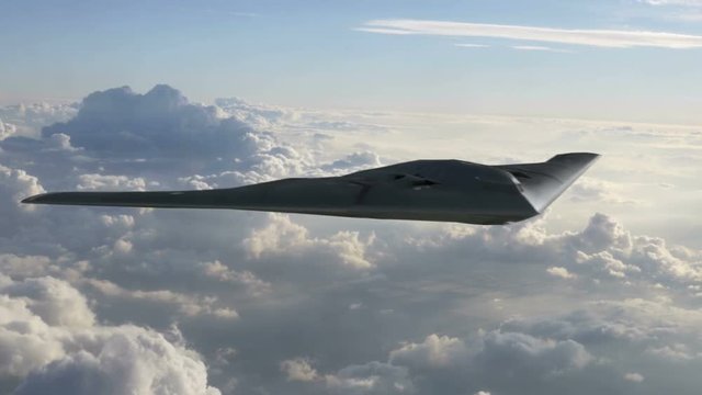 B-2 Stealth Bomber Flying Pass Above Clouds