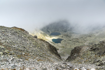 Amazing Landscape with fog over Musalenski lakes,  Rila mountain, Bulgaria