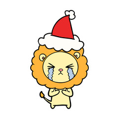 line drawing of a crying lion wearing santa hat