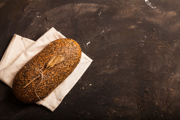 Bread and flour on a dark table