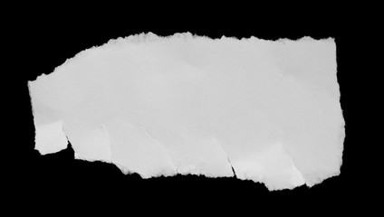 Ripped paper on black background, space for advertising copy.