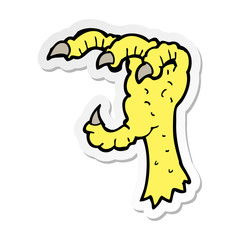 sticker of a cartoon eagle claw