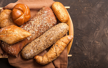 Assortment of baked goods on dark background