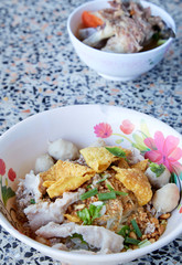 Wide rice noodles with vegetables pork