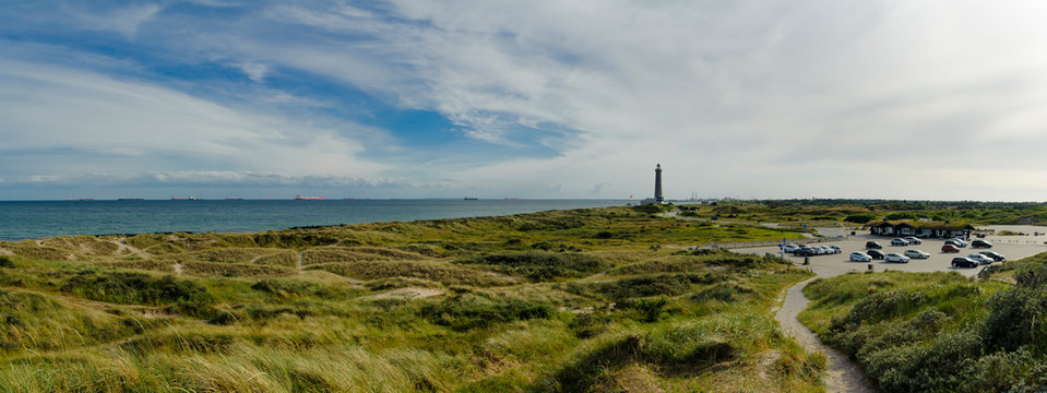 Denmark, Jutland, Skagen, Grenen, dune landscape with lighthouse in background