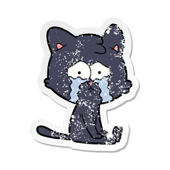 distressed sticker of a cartoon cat