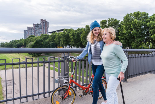 Happy grandmother and granddaughter spending time together