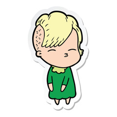 sticker of a cartoon squinting girl