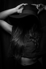 Faceless Girl in Hat