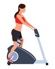 woman working out on gym machine