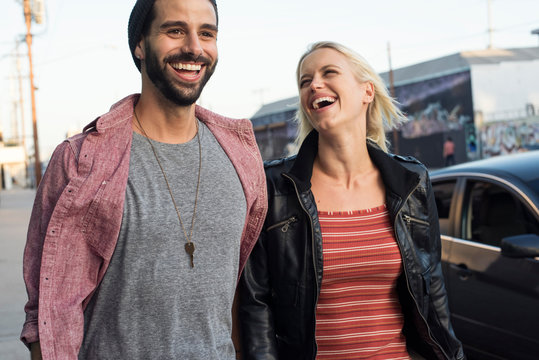 Happy young couple on the go
