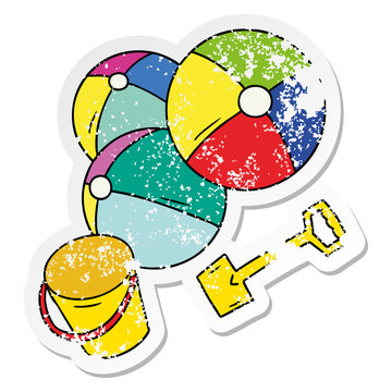 distressed sticker cartoon doodle beach balls with a bucket and spade