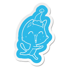 happy cartoon  sticker of a cat meowing wearing santa hat