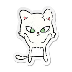 distressed sticker of a cute cartoon cat