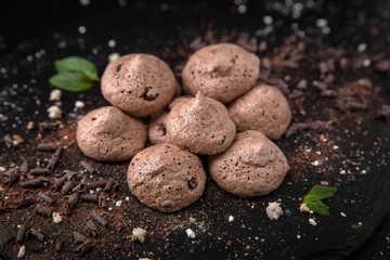 Typical french meringue cookies. Fresh, crispy and airy dessert. Confectionery assortment. 