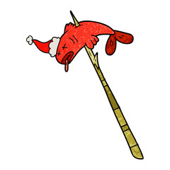 textured cartoon of a fish speared wearing santa hat