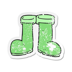 retro distressed sticker of a cartoon wellington boots