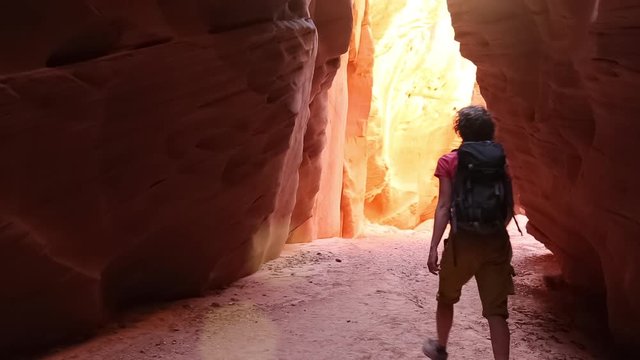 Woman adventure travel hiking exploring in beautiful nature desert canyon