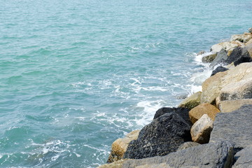 rocks wall in ocean, seawall protection