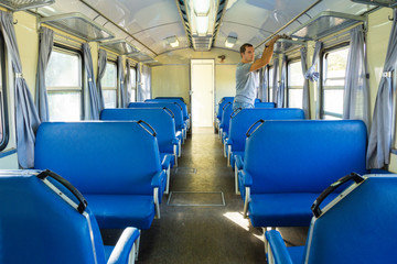 Retro railroad car with one passenger