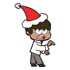 worried line drawing of a boy wearing santa hat