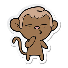 sticker of a cartoon suspicious monkey