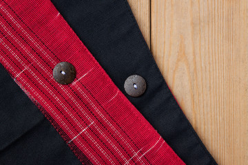 Shirt design with wooden buttons in home 
