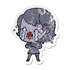 distressed sticker of a cartoon crying vampire girl