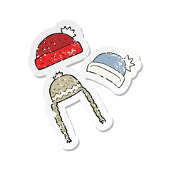 retro distressed sticker of a cartoon winter hats