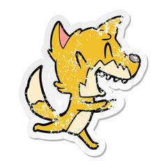 distressed sticker of a laughing fox running away