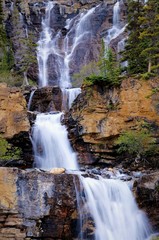 Poster perfect composition of beautiful water cascade fall in Canadian rockies can be witnessed on the way to Jasper Alberta, from Calgary