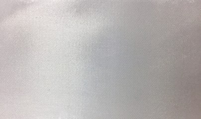 White fabric pattern background.