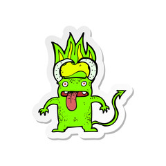 sticker of a cartoon little devil