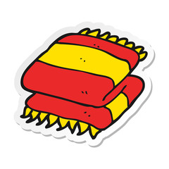 sticker of a cartoon folded towel