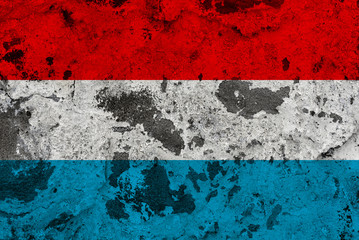 luxembourg flag on old wall