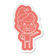 cartoon  sticker of a crying man wearing santa hat