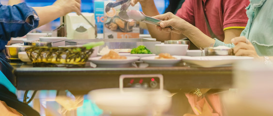 Happiness Enjoy eating Korean BBQ traditional famous food with family in a Korean restaurant