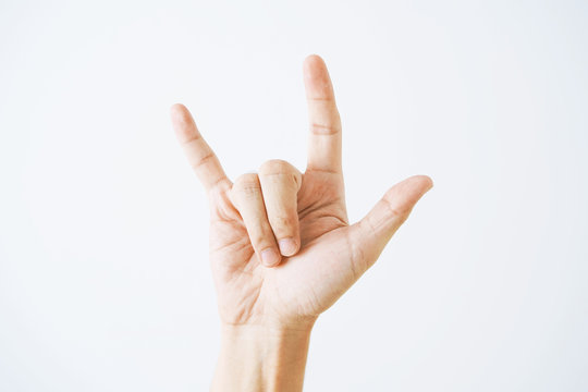Love hand sign on white background.
