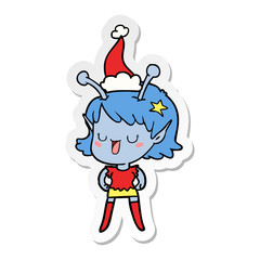 happy alien girl sticker cartoon of a wearing santa hat
