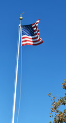 Flag of the USA the flag pole waving in the wind