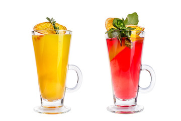 Various colorful fruit and berry cocktails in glass mugs on a white background.