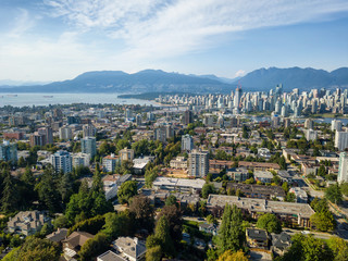 Aerial view of a modern city during a sunny summer day. Taken in Vancouver, BC, Canada.