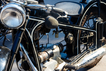 Obraz premium Close-up of motorcycle parked on city street