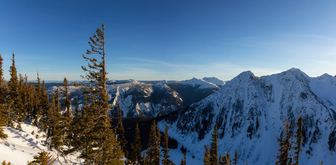 Beautiful Canadian Landscape View during a vibrant winter sunset. Taken on top of Zoa Peak near Hope, British Columbia, Canada.